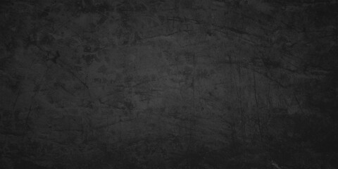 Dark concrete texture wall background. Black grunge cement wall texture for interior design. Copy space for add text.