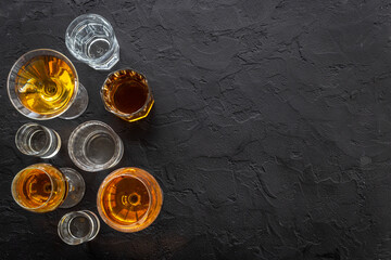 Strong alcohol set. Hard alcoholic drinks in glasses in assortment