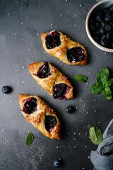 Homemade Blueberry Danish with Puff pastry o holiday background