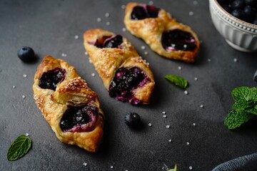 Homemade Blueberry Danish with Puff pastry o holiday background