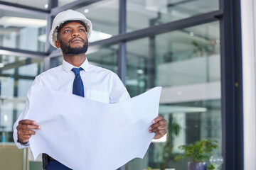 Fototapeta premium Black man, architect and blueprint in construction planning, thinking or contractor at the office. African American male engineer holding project plan for industrial building, layout and architecture
