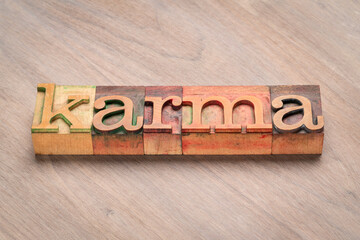 karma word abstract in letterpress wood type printing blocks