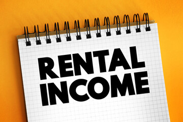 Rental Income - any payment you receive for the use or occupation of property, text concept on notepad
