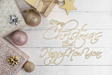 Flat lay composition of Christmas gifts and Christmas decorationon on white wooden background with copy space. Concept Christmas time for web banner .