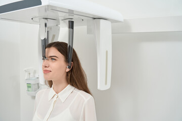 Dental clinic client during CT scanning procedure