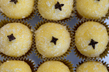 Beijinho, typical Brazilian candy, arranged in packaging