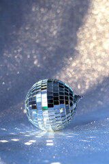 Disco ball and bokeh background. Christmas concept.