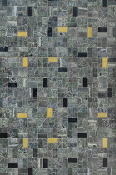 Mosaic of green tiles with yellow, green and graystone colours - Portuguese Azulejo 