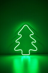Green Christmas tree neon sign on background. Trendy style. Neon concept. Modern style. Neon sign. Custom neon. Home decor.