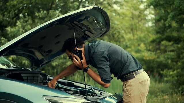 vehicle check engine oil level. open hood motor