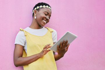 Black woman, tablet and smile of a person on social media with fashion and spring happiness. Flower...