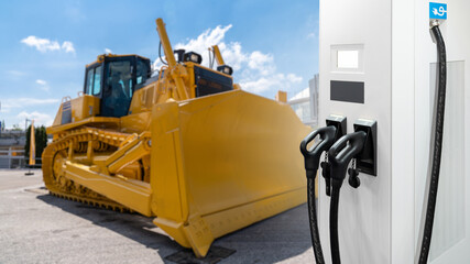 Electric construction bulldozer with charging station. Concept