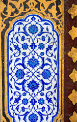 Blue-colored Ottoman ancient tiles on the wall of Topkapi Palace in Istanbul.