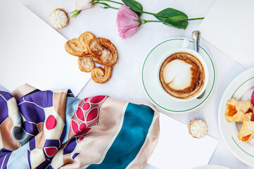 fashion breakfast background with flower and cappuccino