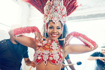 Festival, carnival and portrait of samba dancer dancing for performance, festive celebration or party in Brazil. Mardi gras event, culture and happy woman dance in costume at concert with music band.