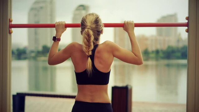exercising pull-up bar. pull-ups exercising fitness workout