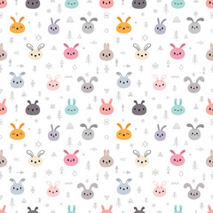 Tribal seamless pattern with cute cartoon rabbits. Abstract print. Hand drawn ethnic background with cute animals. Funny bunny