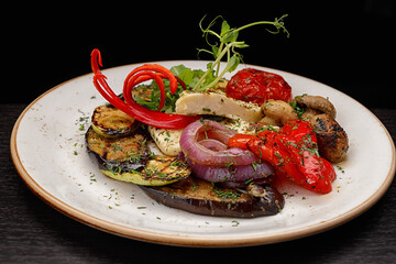 Grilled vegetables with cheese, mushrooms and spices