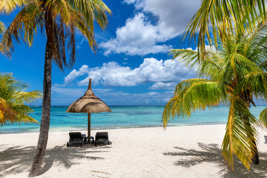 Beautiful sunny beach and sea in tropical resort in Paradise island.	