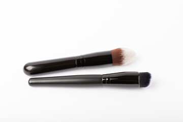 Cosmetic makeup brush isolated on white background. Blush, eyeshadow & contour, foundation, concealer & bronzer, angled brushes. Makeup set. Beauty concept.