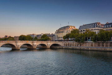 Cityscape of Paris by the Seine river at down. France
