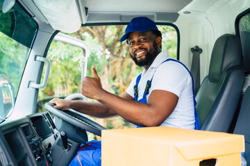 African American man smiling toward camera raise thumb up, confident delivery, moving house,...