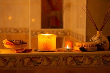 Home bath procedure. Burning candles, brush, Spa supplies. Home spa, aromatherapy