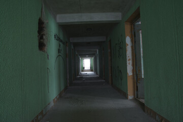 A long corridor in an abandoned building