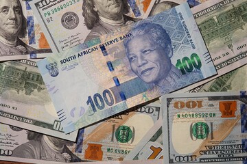 South African Rands and Us dollars Banknotes Background