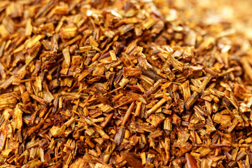 Rooibos close-up, Macro of redbush tea close-up. Leaving South Africa. Selective focus