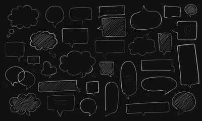 Big set of chalk hand drawn speech bubbles different shape - round, rectangle, fluffy, etc. Big and small white doodle chat clouds. Scribble sketch of dialogue symbols on black background