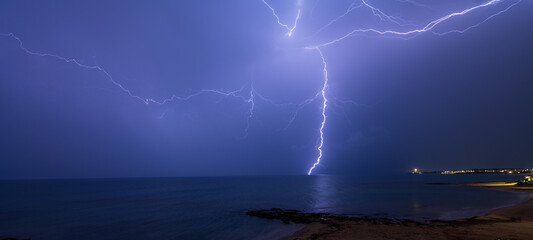 Night sky with forked lightning.