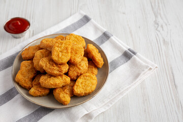 Homemade Chicken Nuggets with Ketchup, side view. Space for text.