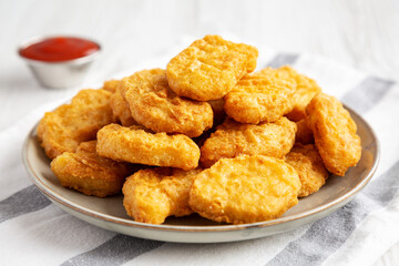 Homemade Chicken Nuggets with Ketchup, low angle view.
