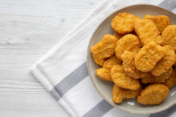 Homemade Chicken Nuggets on a Plate, top view. Flat lay, overhead, from above. Copy space.