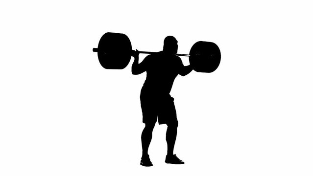 Black silhouette of muscular man squatting with heavy barbell. Bodybuilder doing exercises for buttock, thigh, quadricebs and leg. Powerlifting workout on white studio background, full length.