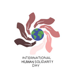 hands holding earth. international human solidarity day is celebrated every year on 20 December.
