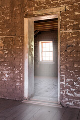 Daylight streaming through window of abandoned house at the Grafton Ghost Town near Zion National Park, Utah