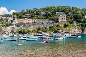 The water bay Baia del Silenzio in Sestri Levante, small town in Liguria, during the summer - obrazy, fototapety, plakaty
