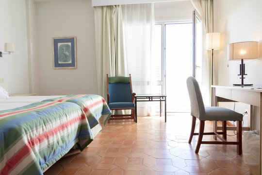 Ayamonte, Huelva, Spain; 12.8.2022: Hotel (National Parador De Ayamonte). Views of the rooms. Hotel room interior in the morning. A lot of light comes in through the window.