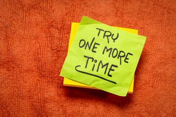 try one more time - handwritten motivational note, determination, persistence and encouragement concept