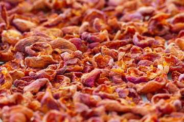 drying apricots on the balcony in the home environment, close-up dried apricots,