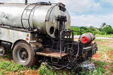 A Closeup of an Asphalt Dispenser