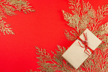 Christmas festive gift box, surprise concept. New Year background in red and gold colors