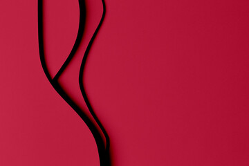 Abstract colored paper texture background. Minimal paper cut style composition with layers of geometric shapes and lines in viva magenta colors. Top view