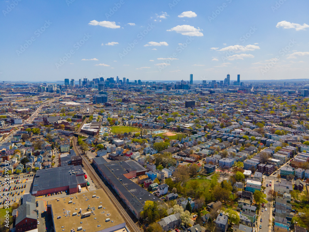 Wall mural somerville city center aerial view on somerville avenue with boston skyline at the background in spr