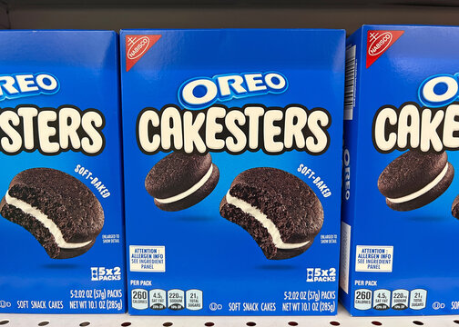 San Leandro, CA - Nov 16, 2022: Grocery store shelf with boxes of Oreo brand Cakesters. Soft baked oreo cookie shaped soft snack cakes.