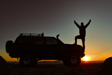 adventurer reaching extraordinary heights by off-road vehicle © emerald_media