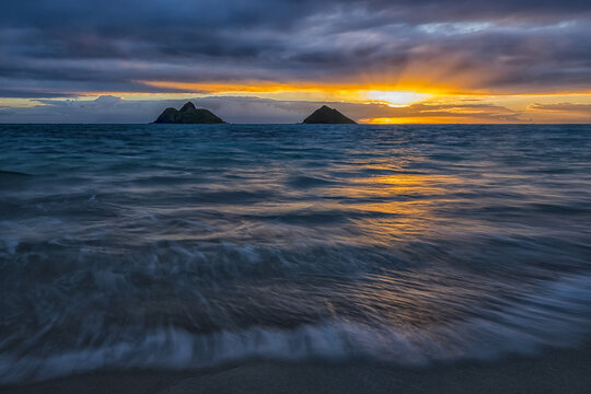 Sunrise over Lanikai Beach; Oahu, Hawaii, United States of America