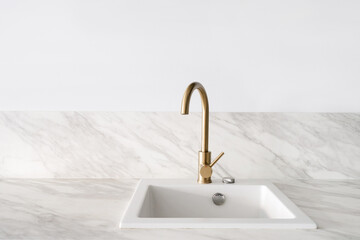 contemporary water tap and new sink indoors